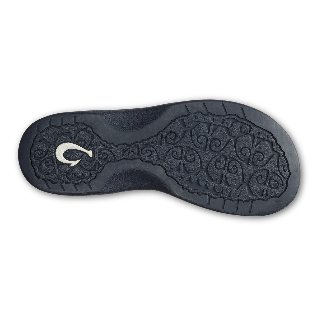 Black rubber sole with ornamental scrollwork pattern and white logo detail.