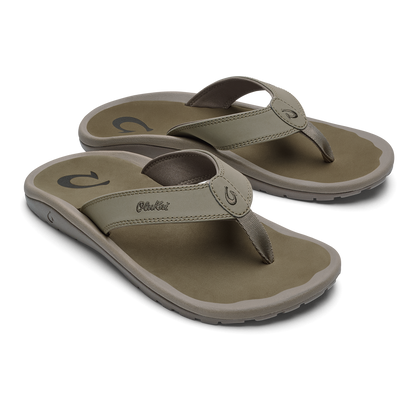 Pair of clay and mustard-colored thong sandals with cushioned soles and adjustable toe straps.