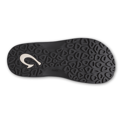 Black flip-flop sole with geometric tread pattern and white curved logo on forefoot.