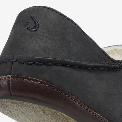 Black suede slipper with dark brown leather trim and embroidered logo detail on the heel.