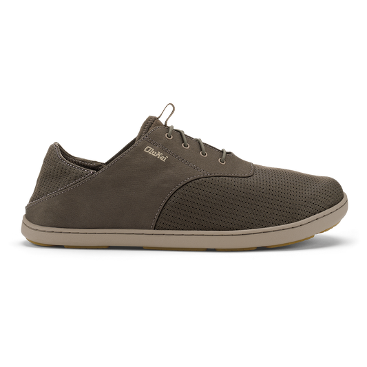 Olive-green lace-up casual shoe with mesh and solid panels, tan sole, and metal eyelets.