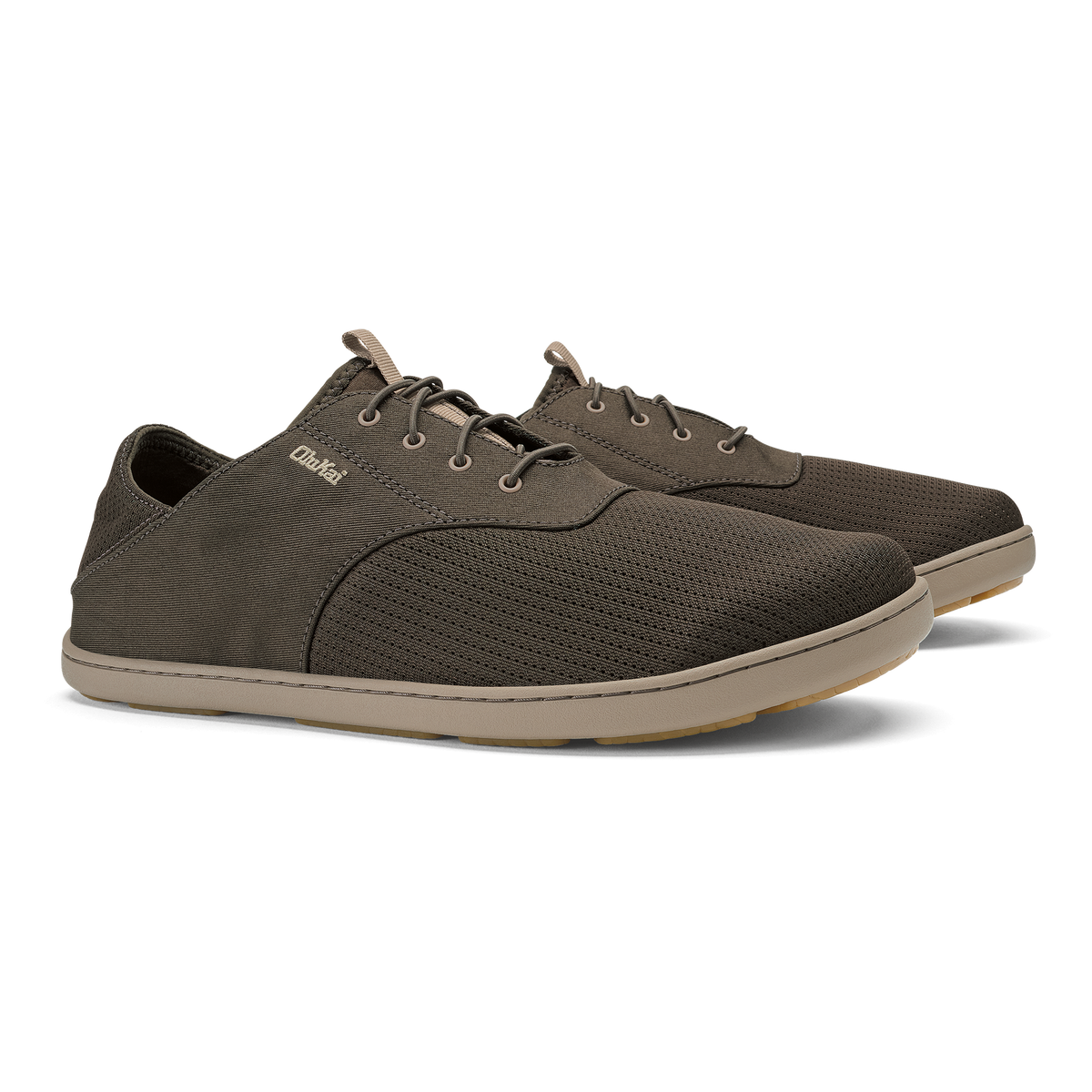 Pair of gray lace-up canvas shoes with tan sole and textured fabric panels.
