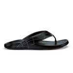 Black flip-flop sandal with quilted strap and stitched detailing on upper.