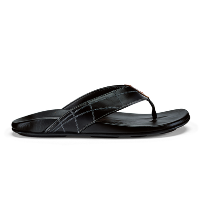 Black flip-flop sandal with quilted strap and stitched detailing on upper.
