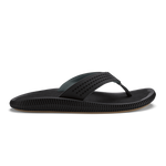Black thong sandal with perforated upper strap and textured sole.