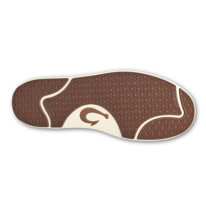 Brown and cream sole pattern with textured geometric design and curved wave-like shape.