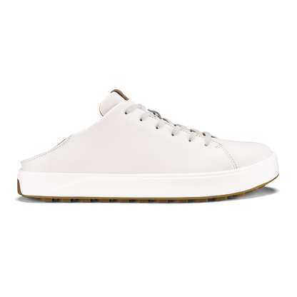 White leather slip-on sneaker with tan and brown sole, lace-up closure, and padded collar.