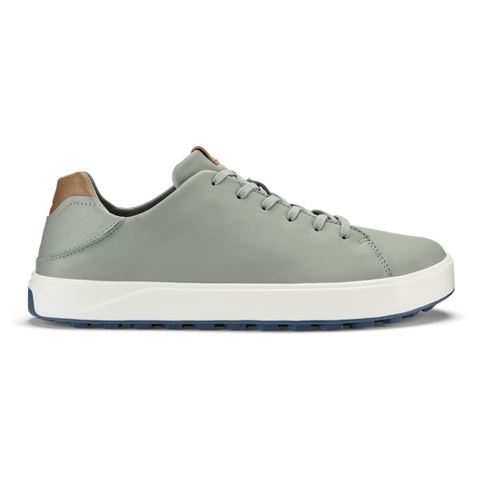 Grey-fog leather sneaker with tan heel panel, white midsole, and dark rubber outsole.