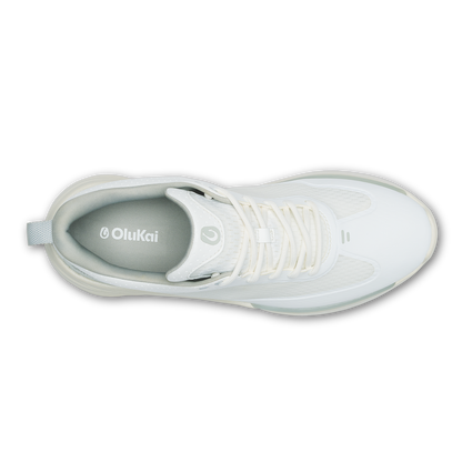 White OluKai Mākena WP high-top sneaker with lace-up closure and gray interior lining, shown from above.
