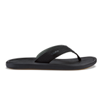 Black lava rock flip-flop sandal with textured strap and flat sole against white background.