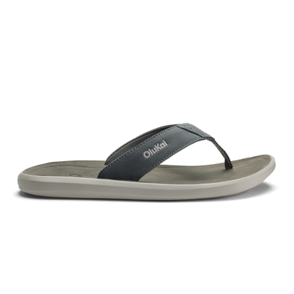 Thong sandal with dark gray upper strap and light gray sole, branded with "Olukai" text.