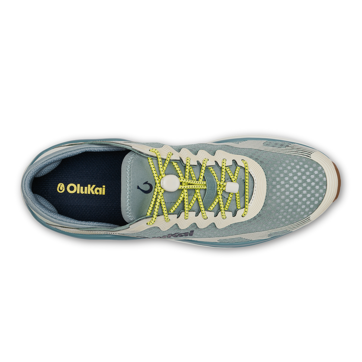 Seagreen and white sand athletic shoe with yellow laces, viewed from above, featuring OluKai branding.