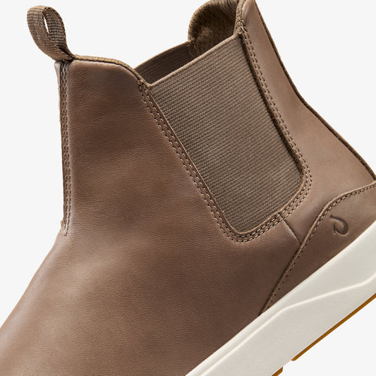 Tan leather Chelsea boot with elastic side panels, fabric pull tab, and white rubber sole.