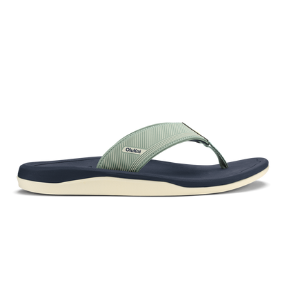 Seagreen and trench blue thong sandal with cream-colored sole and OluKai branding on the upper strap.