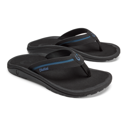 Pair of black thong sandals with slate blue accent stripes and foam footbeds.