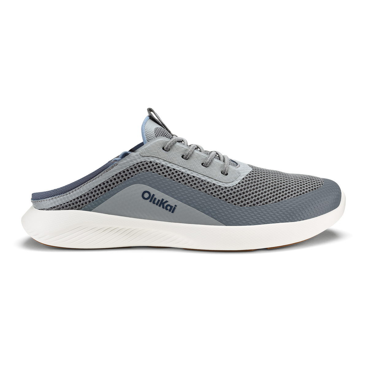 Charcoal and sharkskin slip-on running shoe with mesh upper, white sole, and Olukai branding on the side.