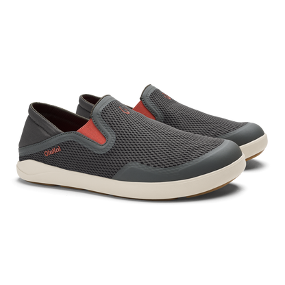 Gray slip-on sneaker with textured mesh upper, coral-red accent panel, and cream rubber sole.