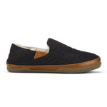Black quilted slip-on shoe with tan leather trim and cream fleece lining.