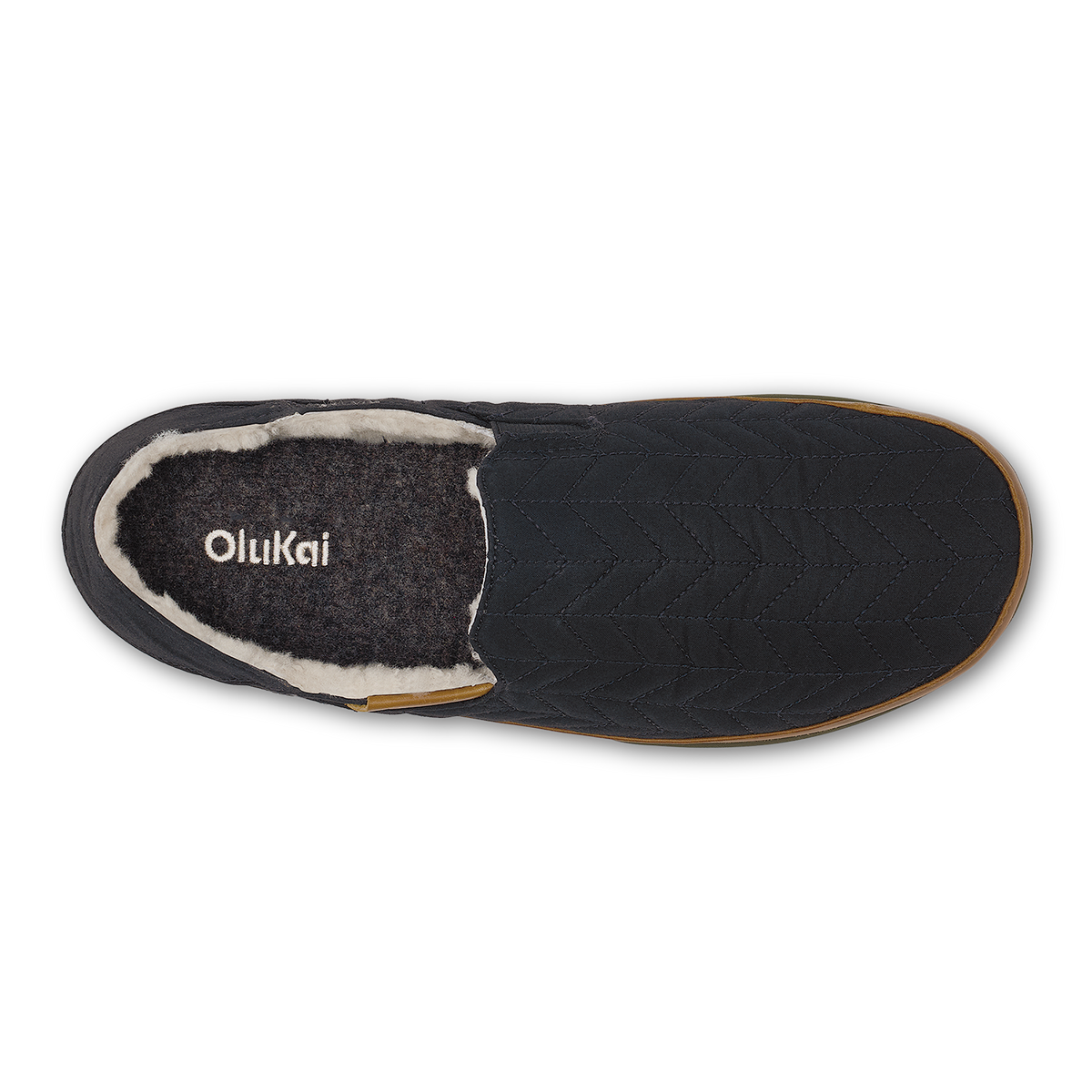 Black slip-on slipper with quilted upper, fleece lining, and tan sole, shown from above.