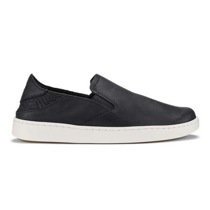 Black leather slip-on shoe with white sole, shown in profile view.