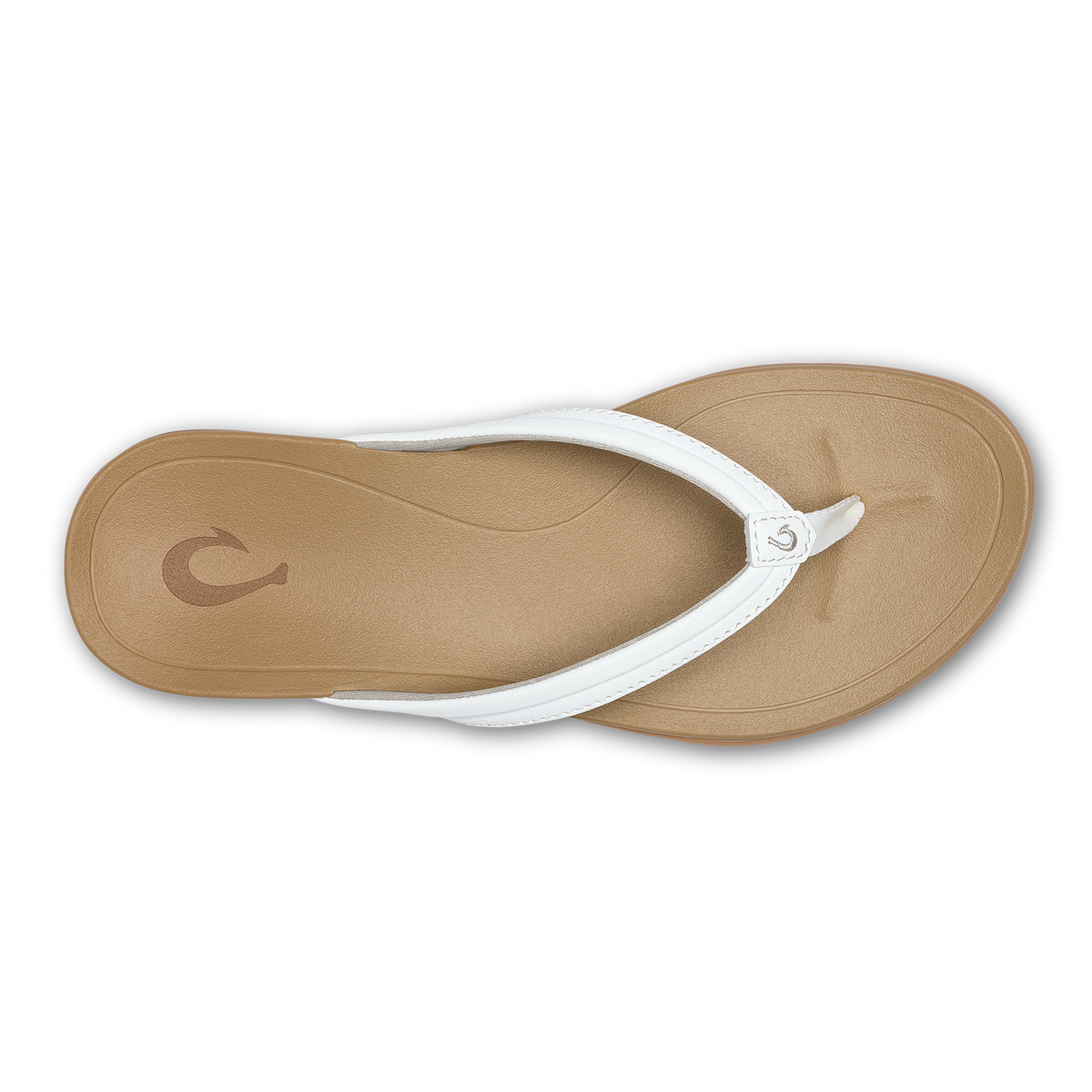 Tan thong sandal with bright white straps and curved footbed, shown from above.
