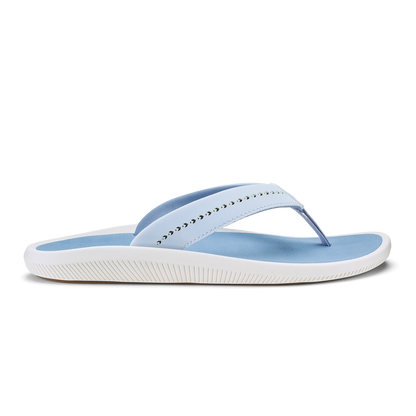Blue and white flip-flop sandal with studded strap and textured white sole.