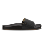 Black slide sandal with woven texture upper, tan footbed, and metallic accent buckle.