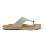 Cream and tan thong sandal with padded fabric upper and cushioned sole.