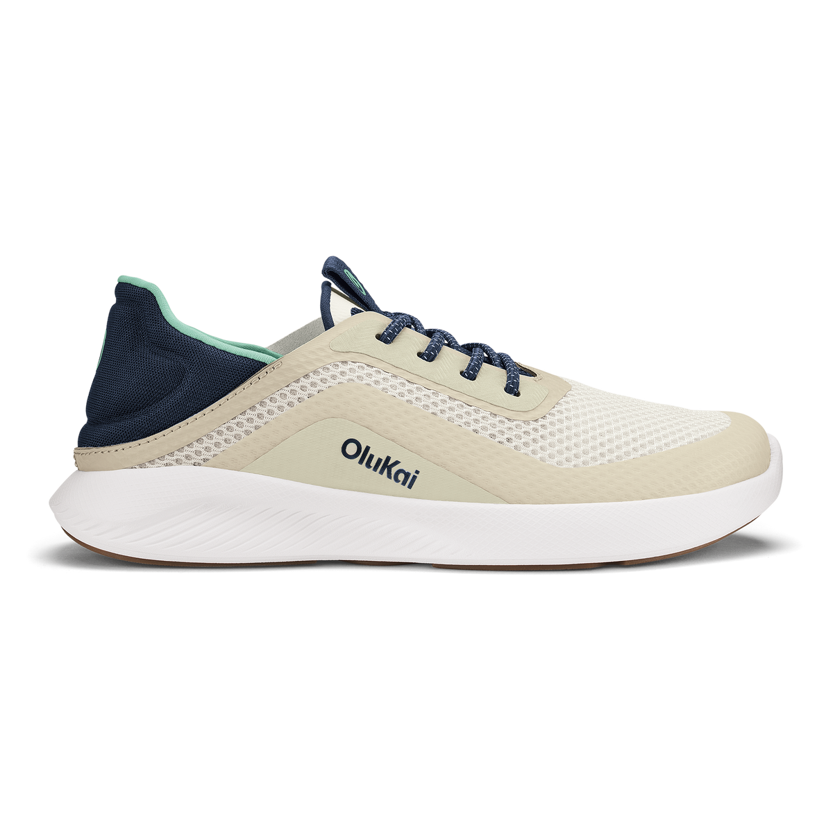 Olukai Kialoa running shoe in cream with white sole, navy heel counter, and dark blue laces.