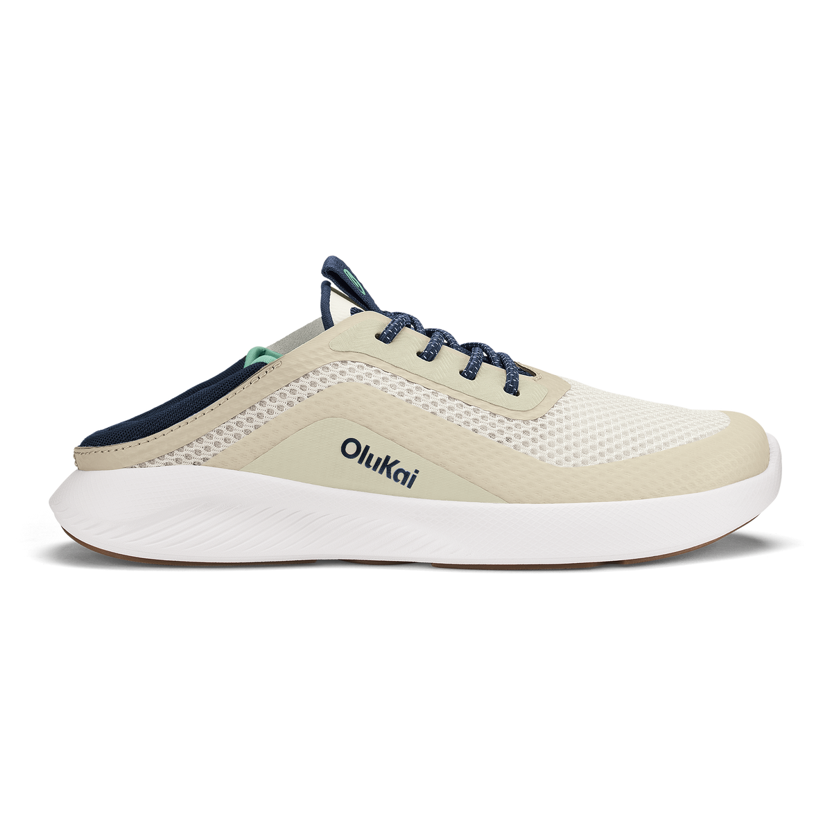 Kialoa sneaker in white sand with navy blue accents, white sole, and dark blue laces shown in side profile.