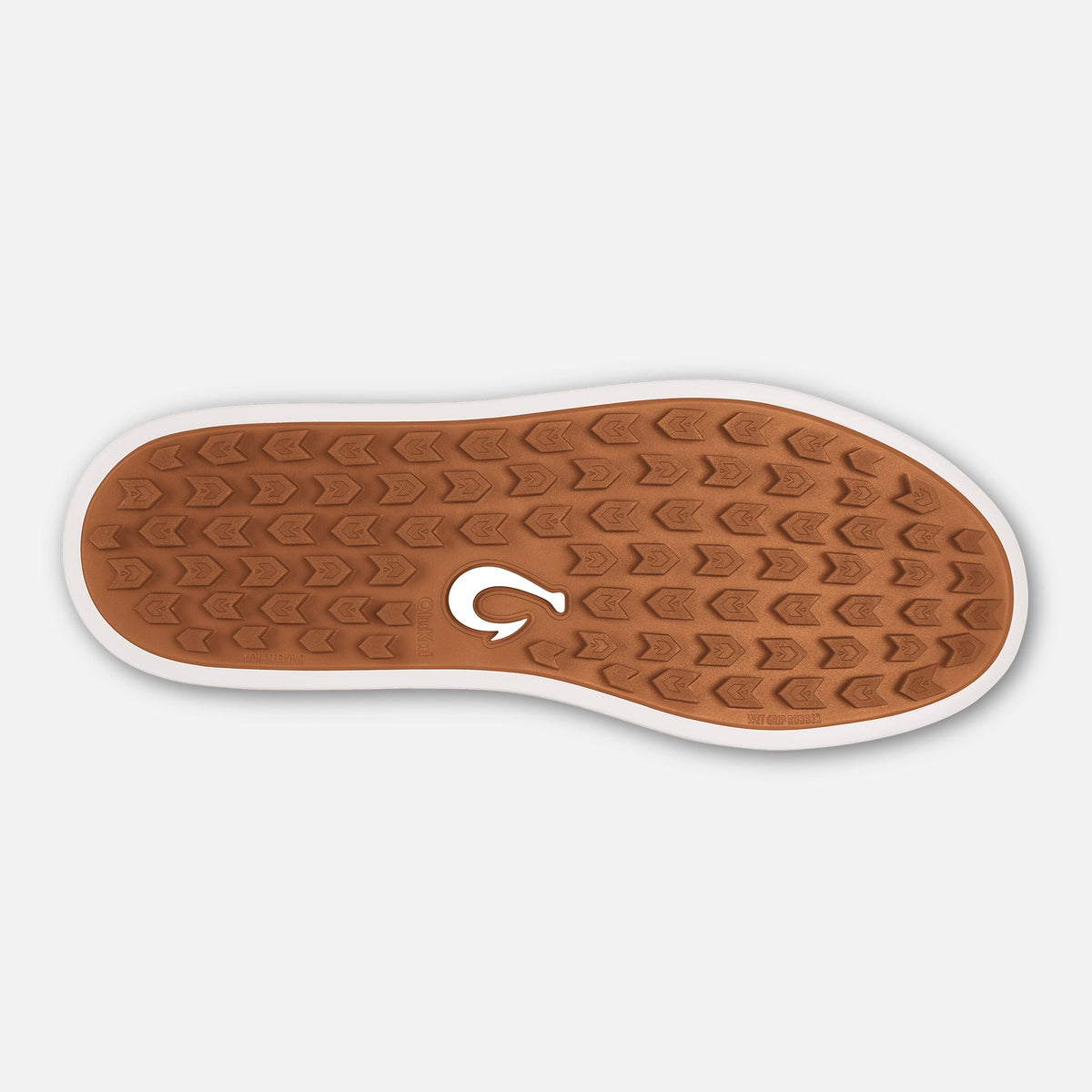 Tan rubber sole with white edge and embossed chevron pattern, featuring white logo.