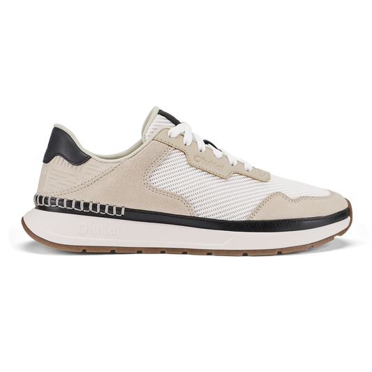 Koke sneaker in bright white and ecru with black heel counter and trim, mesh and suede upper, white midsole, and tan rubber o