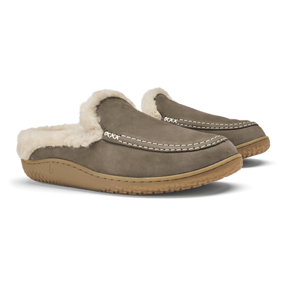 Walnut suede moccasin slippers with cream fleece lining and tan rubber soles, shown as a pair.
