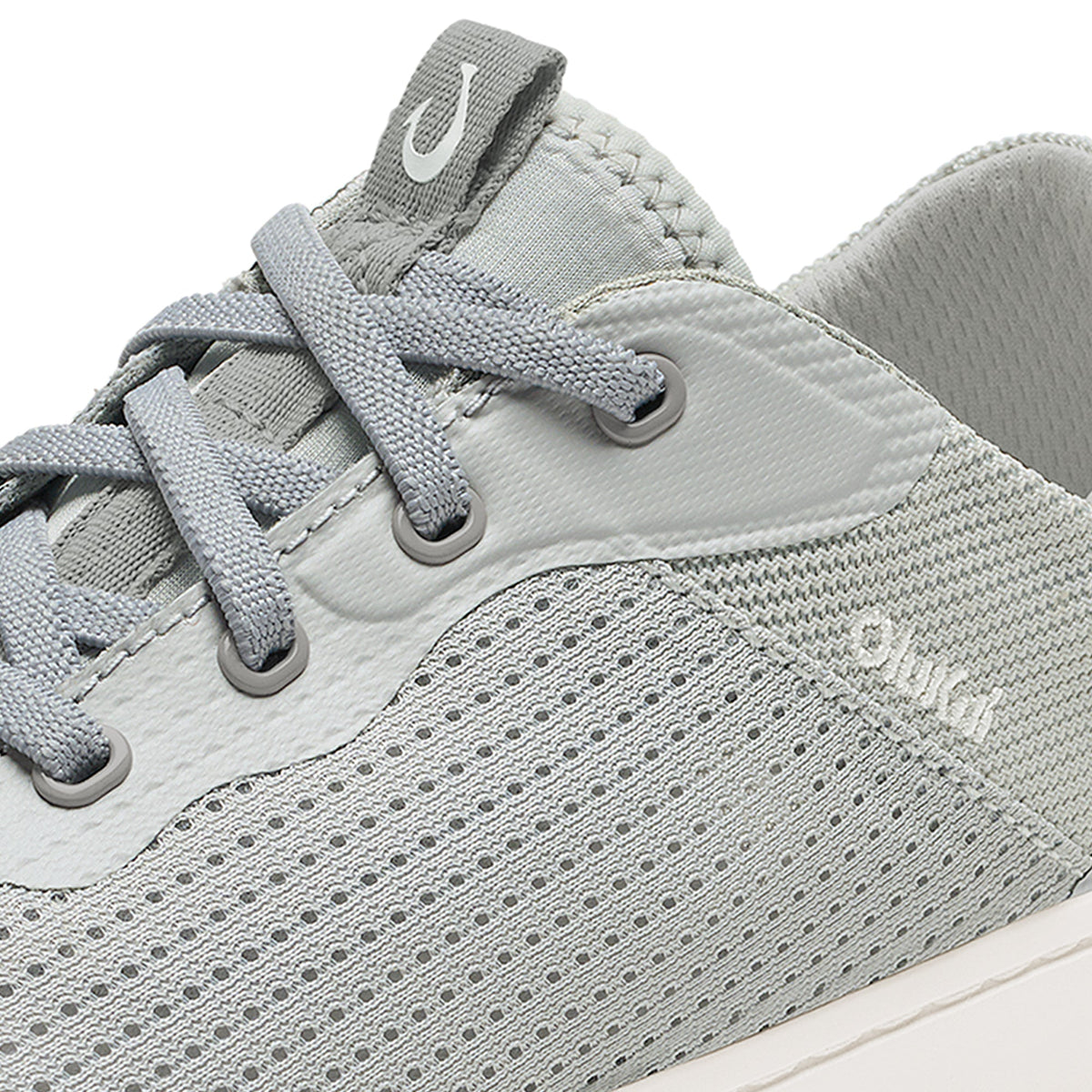 Cloud grey lace-up sneaker with mesh and leather upper, perforated details, and white sole.